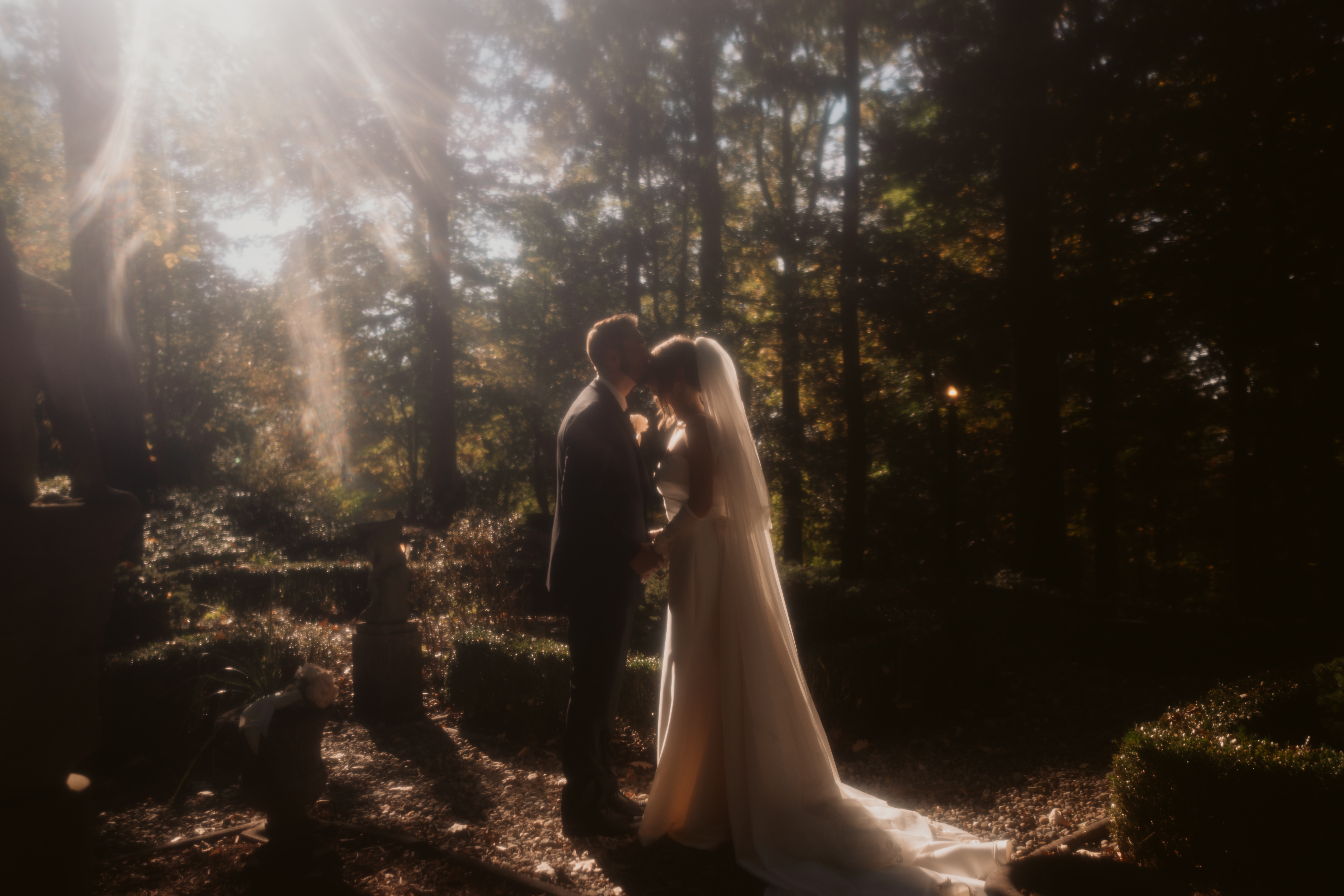 Bride and groom in the gardens of The Mansion in Butler